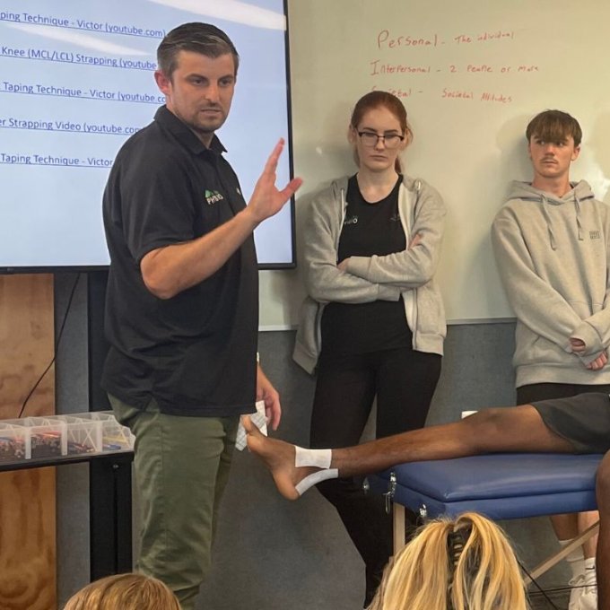 Andrew Newmarch (Senior Physiotherapist) and Sacha MacBain
(Physiotherapist) from Green Bay Physio facilitated a strapping clinic with students from GBHS's 1st XI Girls' and Boys' Football, Senior Basketball and Prem Netball teams.

Students were taught about injury prevention, overtraining, sleep, hydration, and how to strap common sporting injuries.